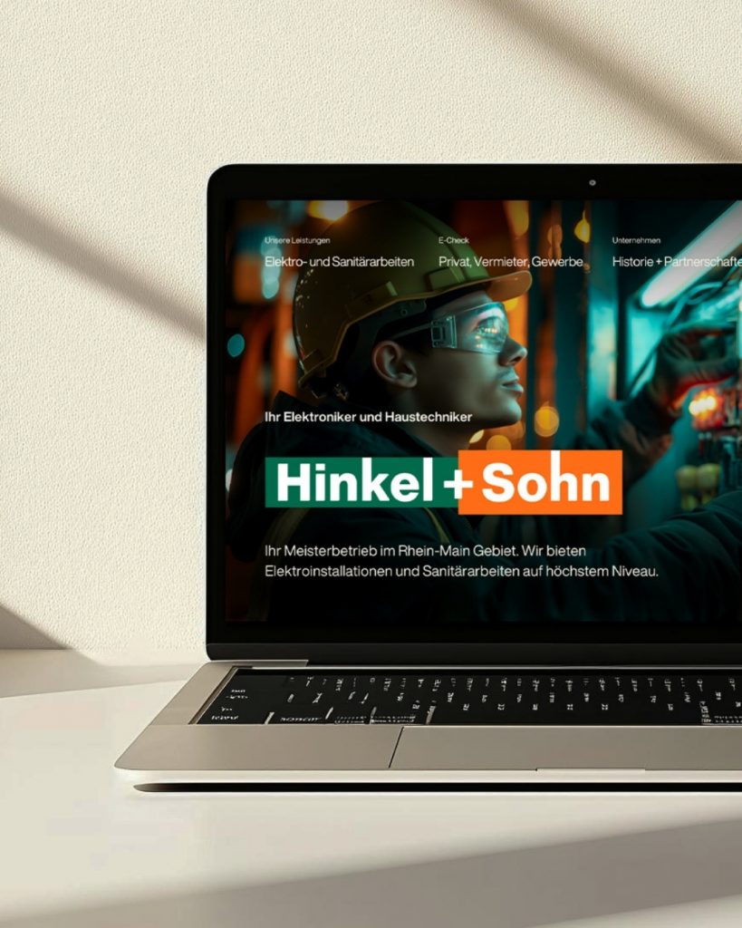 Ein Mockup der Hinkel+Sohn Webseite. Sie zeigt das Firmenlogo vor einem Bild eines Elektrikers, welcher eine Installation vornimmt.